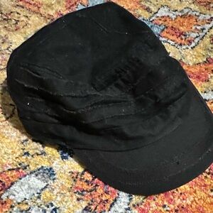 Newsboy-style brimmed hat